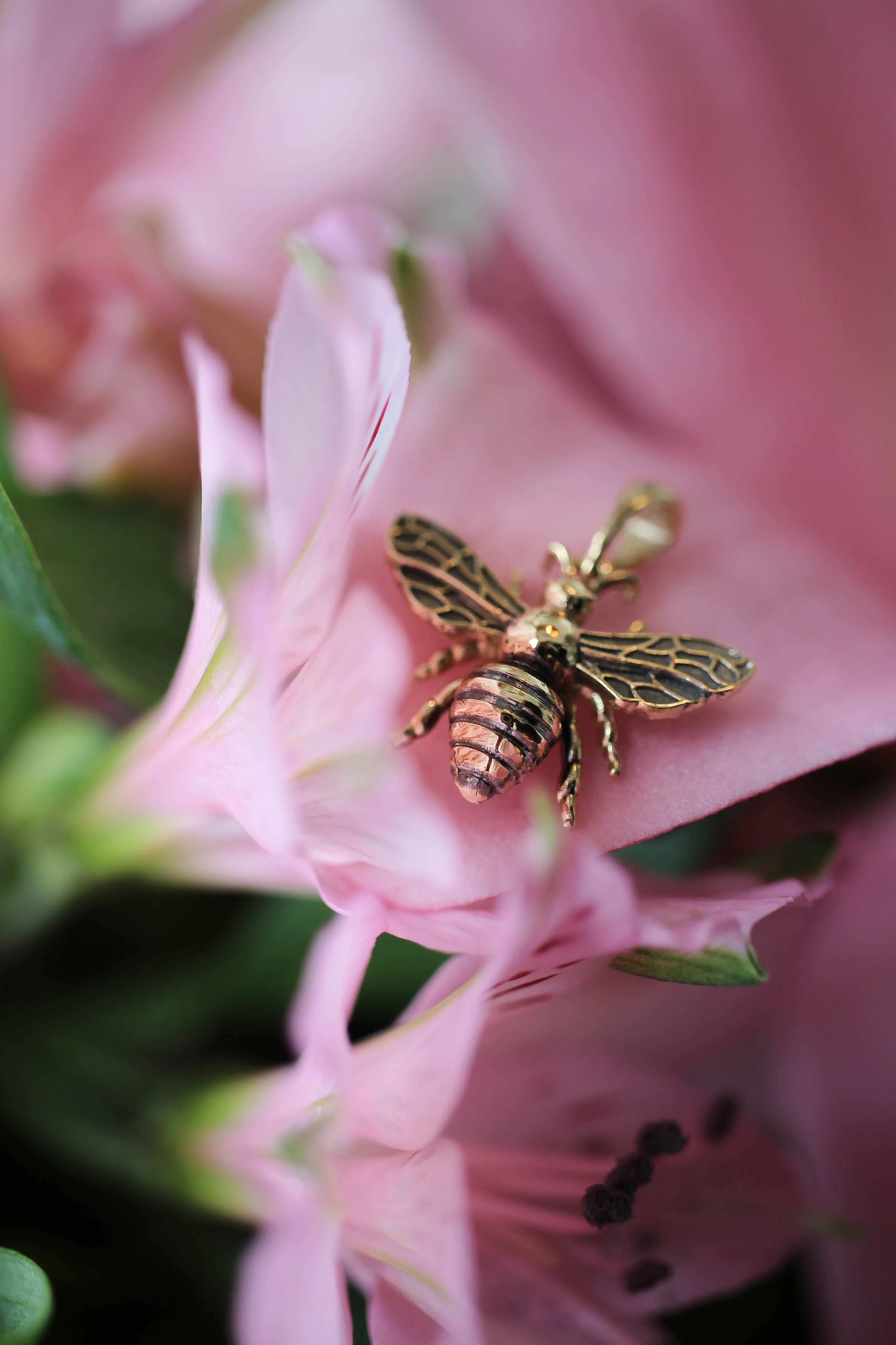 Gold bee pendant